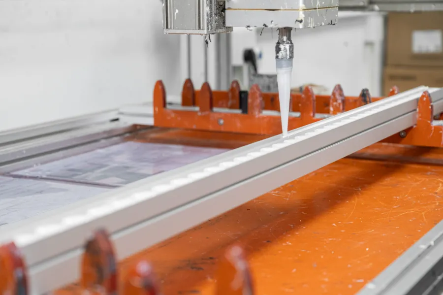 In-house adhesive and material R&D lab with custom project team workflow